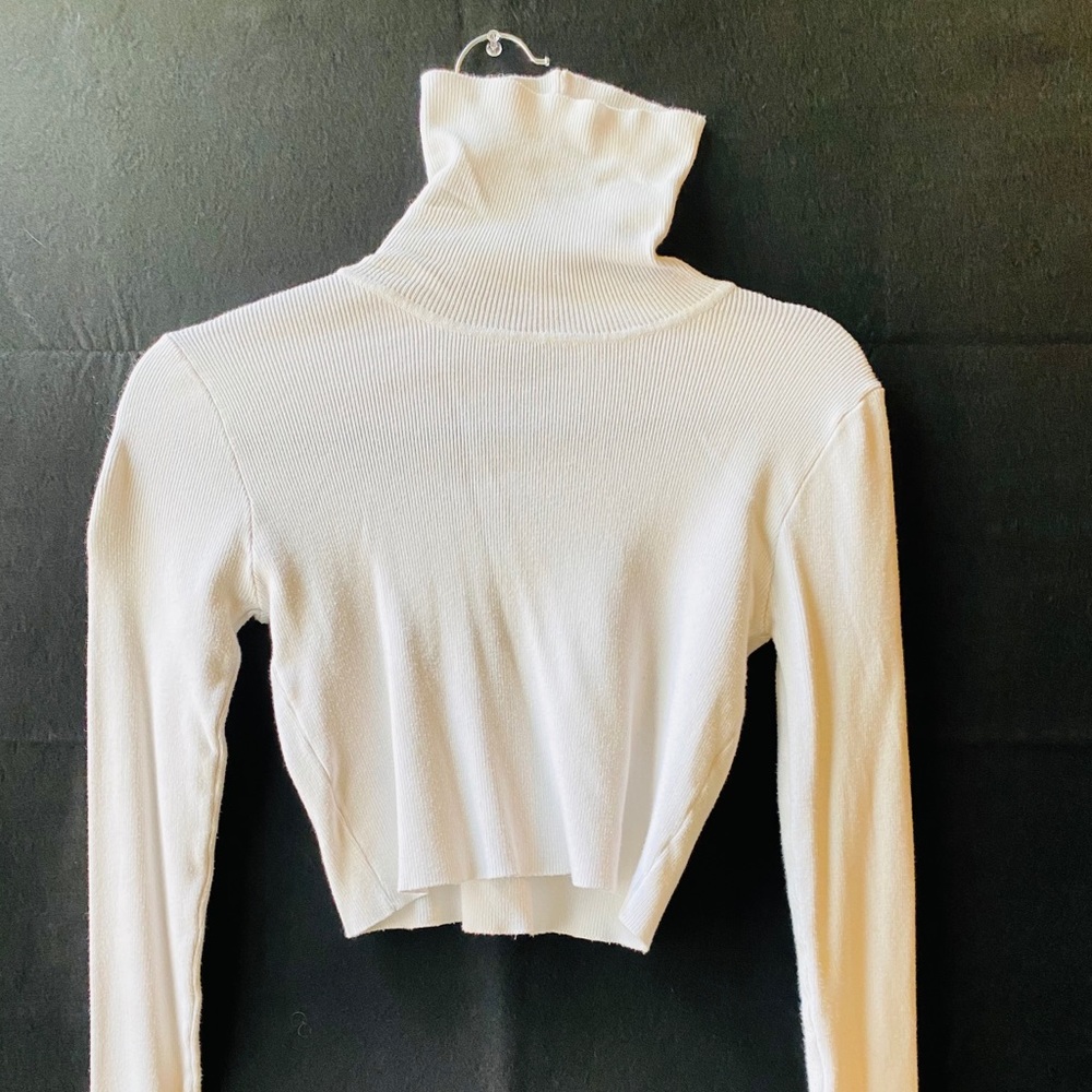 White off turtle neck knit top